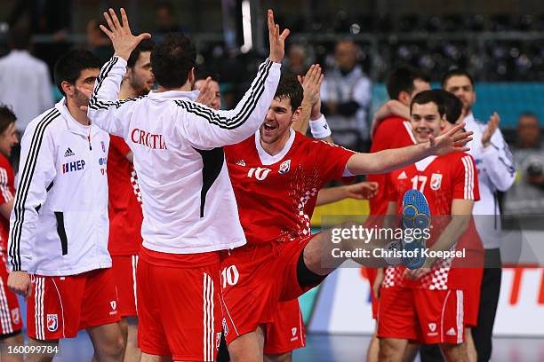 Marko Kopljar and Jakov Gojun of Croatia celebrate after the Men's Handball World Championship 2013 third place match between Slovenia and Croatia at...