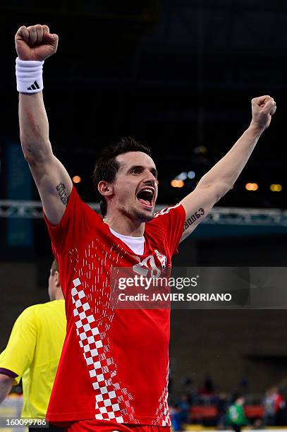 Croatia's Ivan Nincevic celebrates their victory at the end of the 23rd Men's Handball World Championships bronze medal match Slovenia vs Croatia at...