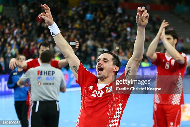 Ivan Nincevic of Croatia celebrates after the Men's Handball World Championship 2013 third place match between Slovenia and Croatia at Palau Sant...