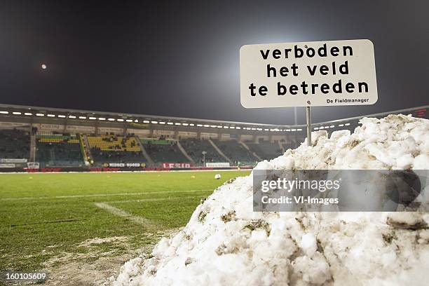 Verboden het veld te betreden snow during the Dutch Eredivise match between ADO Den Haag and Roda JC Kerkrade at the Kyocera Stadium on January 26,...