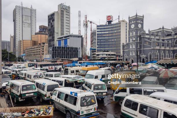 Taxi vans parked near commercial office buildings in the Central Business District of Lagos, Nigeria, on Monday, Aug. 14, 2023. Nigerian President...