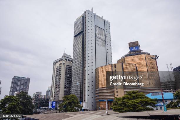 High rise commercial office towers alongside the First Bank of Nigeria Ltd. Headquarters, right, in the Central Business District of Lagos, Nigeria,...