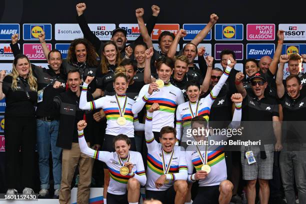 Gold medalists Stefan Bissegger, Stefan Kung, Mauro Schmid, Elise Chabbey, Nicole Koller, Marlen Reusser and Team Switzerland celebrate winning...