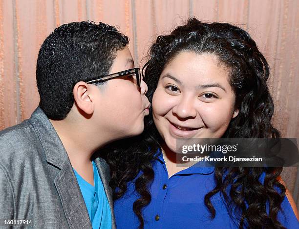 Actors Rico Rodriguez and his sister Raini Rodriguez in the green room during the 19th Annual Screen Actors Guild Awards red carpet roll out and...