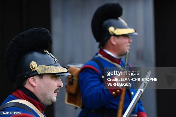 Re-enactors, in period costume of Bavarian soldiers, hold Dreyse rifles as they re-enact the 1870 war and the annexation during a commemoration of...