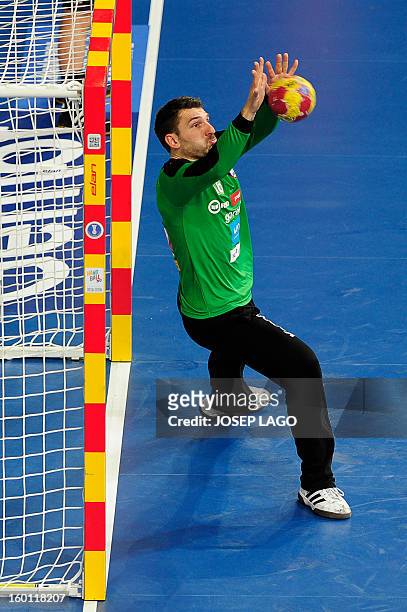 Slovenia's goalkeeper Primoz Prost stops a ball during the 23rd Men's Handball World Championships bronze medal match Slovenia vs Croatia at the...