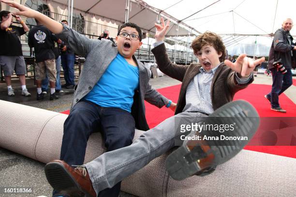 Actors Rico Rodriguez and Nolan Gould participating in the Red Carpet Roll Out for The 19th Annual Screen Actors Guild Awards at The Shrine Expo Hall...