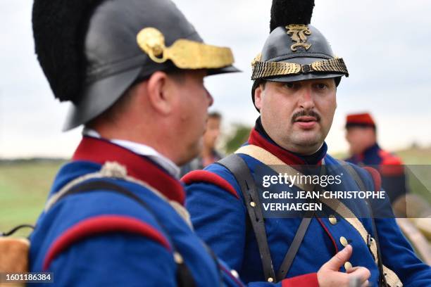 Re-enactors, in period costume of Bavarian soldiers, re-enact the 1870 war and the annexation during a commemoration of the Franco-Prussian war, in...