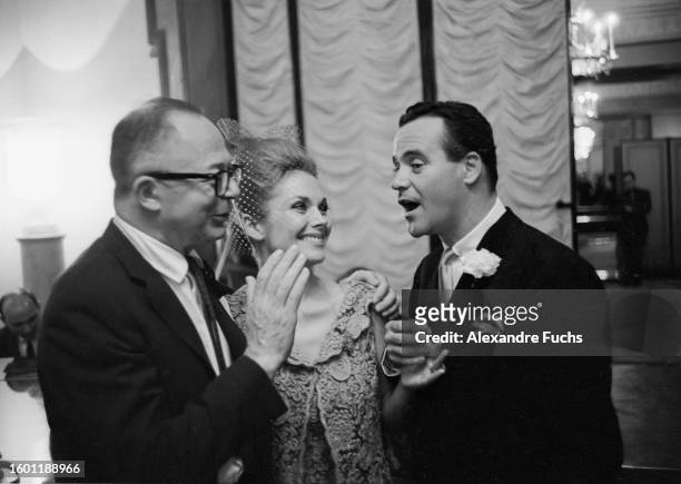 Director Billy Wilder with actor Jack Lemmon and Felicia Farr at their wedding at Paris, in 1962.
