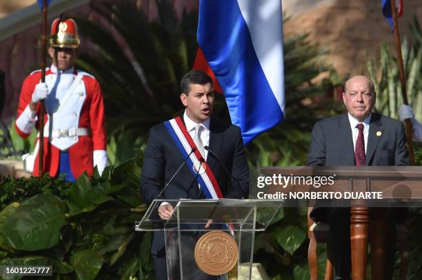 Paraguay's new President Santiago Peña delivers a speech during his inauguration at the esplanade of Lopez Presidential Palace in Asuncion on August...