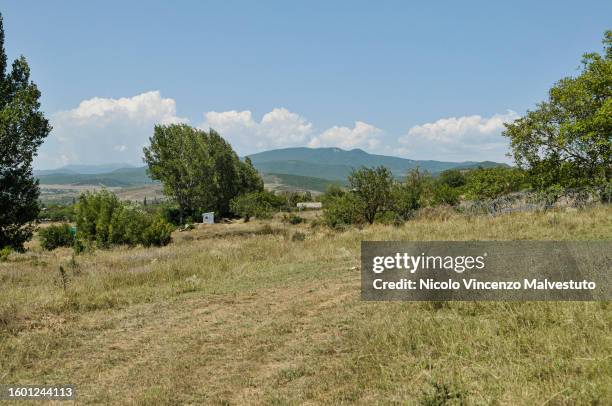 Barbwire fence and a banner erected after the Russian occupation of South Ossetia region in 2008 on August 08, 2023 in Khurvaleti, Georgia. In 2008,...