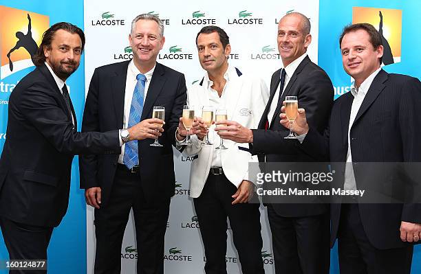 Guy Forget, Tennis Australia CEO Steve Wood, CEO of Lacoste Asia Pacific Frank Cancelloni and Henri Leconte celebrate the announcement of a five-year...