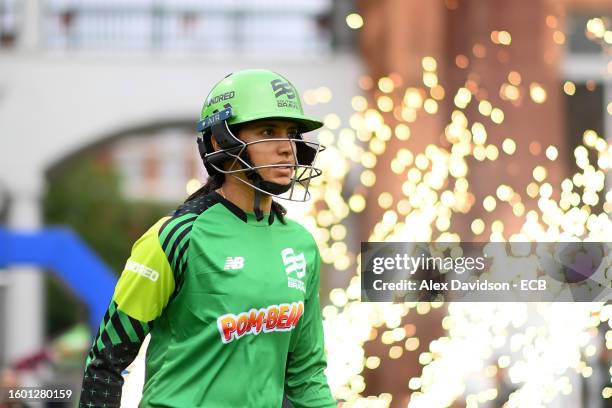 Smriti Mandhana of Southern Brave enters the pitch to bat during The Hundred match between London Spirit Women and Southern Brave Women at Lord's...