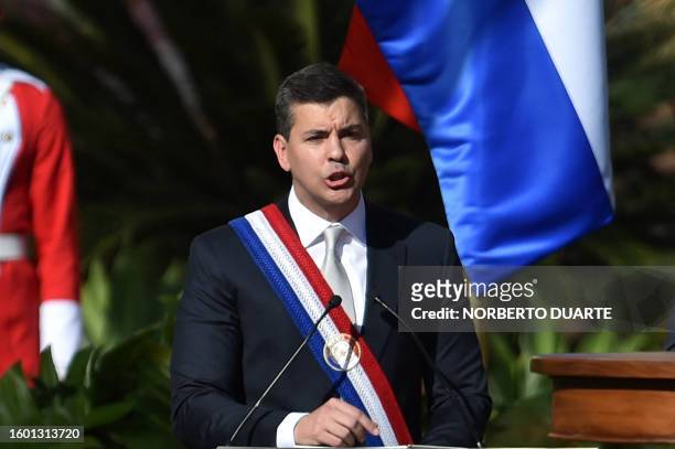 Paraguay's new President Santiago Peña delivers a speech during his inauguration at the esplanade of Lopez Presidential Palace in Asuncion on August...