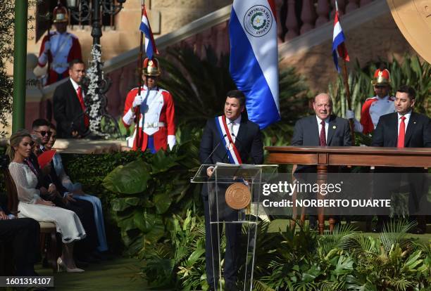 Paraguay's new President Santiago Peña delivers a speech during his inauguration at the esplanade of Lopez Presidential Palace in Asuncion on August...