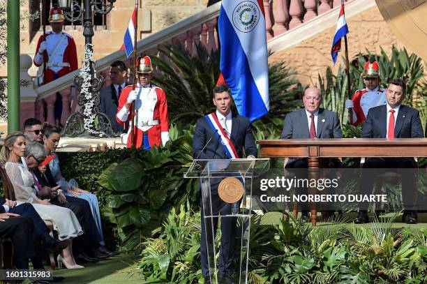 Paraguay's new President Santiago Peña delivers a speech during his inauguration at the esplanade of Lopez Presidential Palace in Asuncion on August...