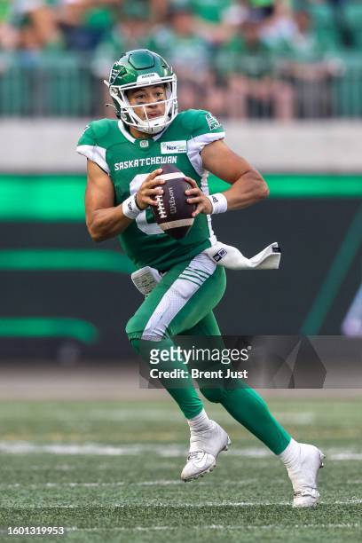 Mason Fine of the Saskatchewan Roughriders scrambles with the ball in the game between the Ottawa Redblacks and Saskatchewan Roughriders at Mosaic...