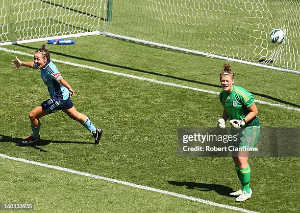 Nicola Bolger of Sydney FC celebrates her goal past Victory goalkeeper Brianna Davey during the W-League Grand Final between the Melbourne Victory...