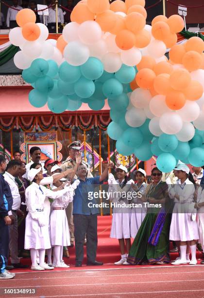 Chief Minister Arvind Kejriwal releasing balloons during the 77th Independence Day function at the Chhatrasal Stadium on August 15, 2023 in New...