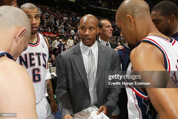 Head Coach Byron Scott of the New Jersey Nets instructs the players throughout the time-out during the NBA game against the Atlanta Hawks at the...