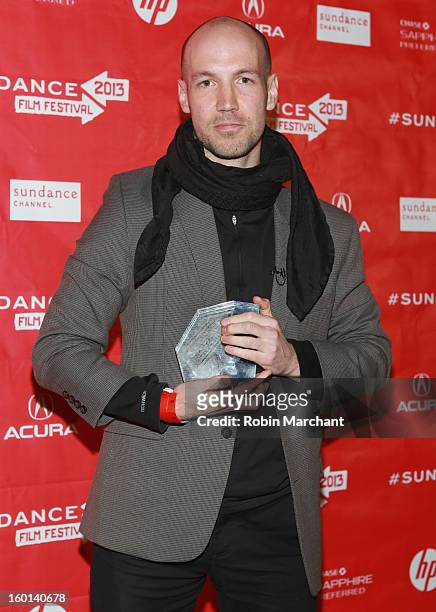 Richard Rowley the Winner of the Cinematography Award: U.S. Documentary for Dirty Wars poses with award at the Awards Night Ceremony during the 2013...