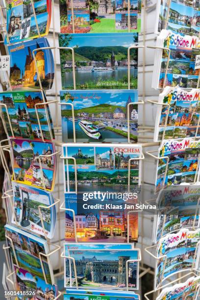 rek vol met kleurrijke wenskaarten - rack stock pictures, royalty-free photos & images