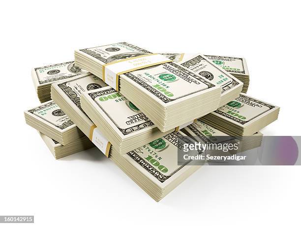 stack of $100 bills on a white background - pile of money stock pictures, royalty-free photos & images