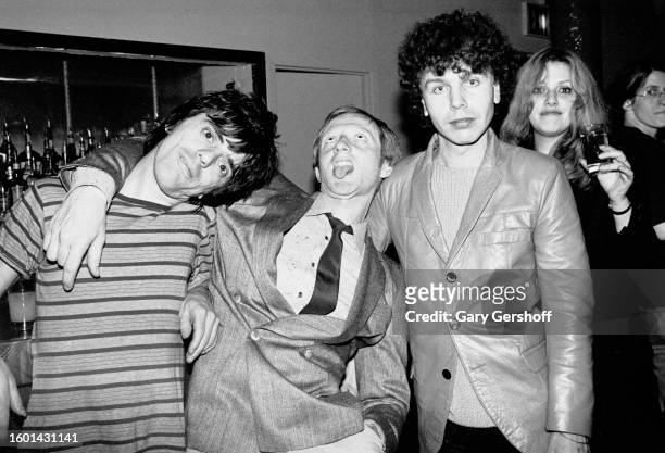 View of Australian-born producer Mike Chapman with American Punk musicians, Frank Infante and Nigel Harrison, both of the band Blondie, at Club...