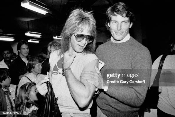 View of American Heavy Metal musician Jay Jay French , of the group Twisted Sister, and actor Christopher Reeve as they attend an afterparty at Club...