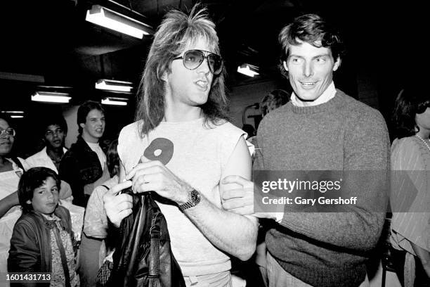 View of American Heavy Metal musician Jay Jay French , of the group Twisted Sister, and actor Christopher Reeve as they attend an afterparty at Club...