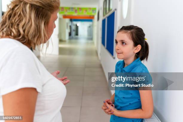 teacher telling  girl students off - girls wrestling stock pictures, royalty-free photos & images