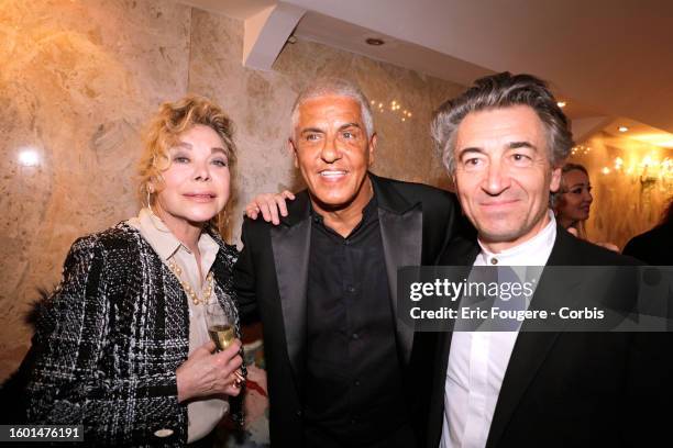 Samy Naceri with Grace de Capitani and her husband Jean-Pierre Jacquin pose during a portrait session in Paris, France on .