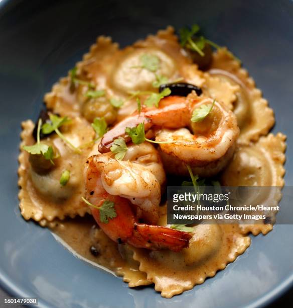 Ravioli con Gamberi del Golfo: Gulf shrimp and spinach ravioli, thyme and onion sauce with black garlic photographed at Sud Italia, Wednesday, Jan. 3...