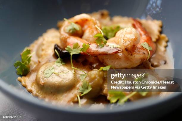 Ravioli con Gamberi del Golfo: Gulf shrimp and spinach ravioli, thyme and onion sauce with black garlic photographed at Sud Italia, Wednesday, Jan. 3...