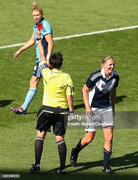 Referee Kate Jacewicz sends off Maika Ruyter-Hooley of the Victory during the W-League Grand Final between the Melbourne Victory and Sydney FC at...