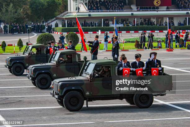 veterans passing through the parade ground with 4x4 land rover defender tdi vehicles on 29 october republic day. - 29 ekim stock pictures, royalty-free photos & images