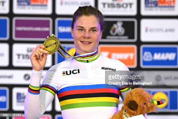 Gold medalist Lotte Kopecky of Belgium celebrates winning during the medal ceremony after the Women Elite Points Race at the 96th UCI Cycling World...