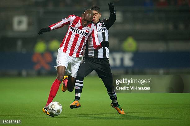 Atiba Hutchinson of PSV, Everton Ramos da Silva of Heracles Almelo during the Dutch Eredivise match between Heracles Almelo and PSV Eindhoven at the...