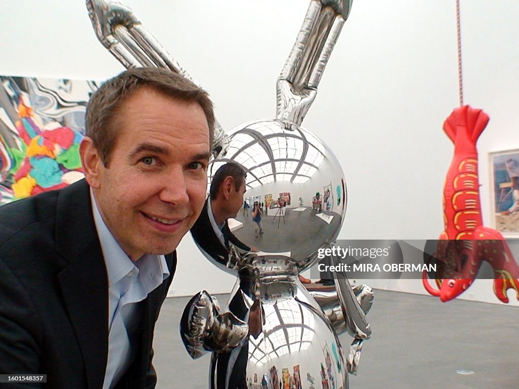 Jeff Koons poses with his iconic Rabbit sculpture in Chicago on May ...