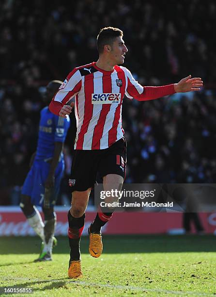 Marcello Trotta of Brentford celebrates scoring during the FA Cup with Budweiser Fourth Round match between Brentford and Chelsea at Griffin Park on...