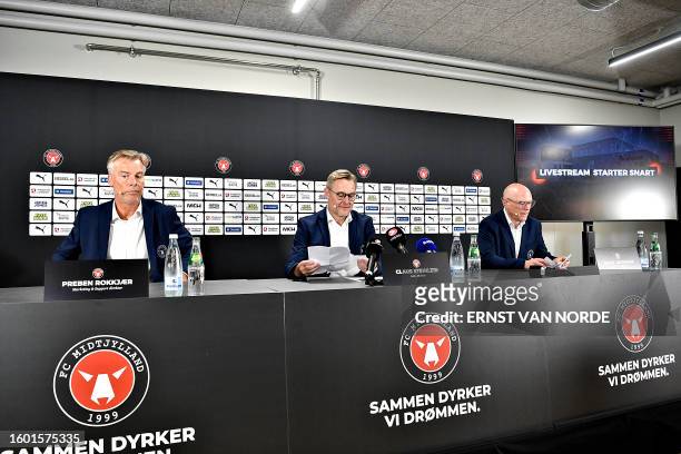 Midtjylland's Preben Rokkjaer, CEO Claus Steinlein and Jacob Joergensen hold a joint press conference related to the club's future, on August 15,...