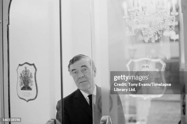 English fashion designer Norman Hartnell , dressmaker to the Queen, circa 1963.