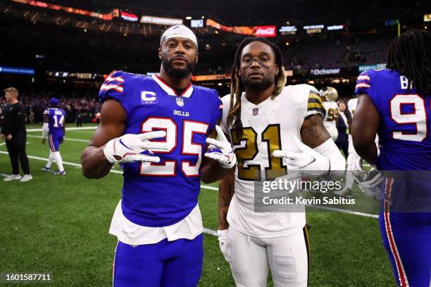 Taiwan Jones of the Buffalo Bills poses for a photo with Bradley Roby of the New Orleans Saints after an NFL game at the Caesars Superdome on...