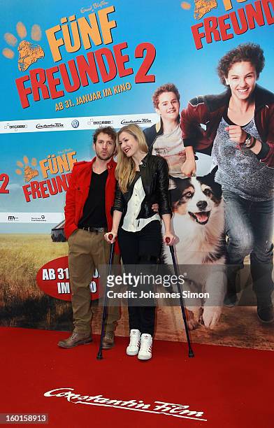 Sebastian Gerold and Genija Rykovaarrive for the 'Fuenf Freunde 2' movie premiere at CineMaxx Cinema on January 27, 2013 in Munich, Germany.