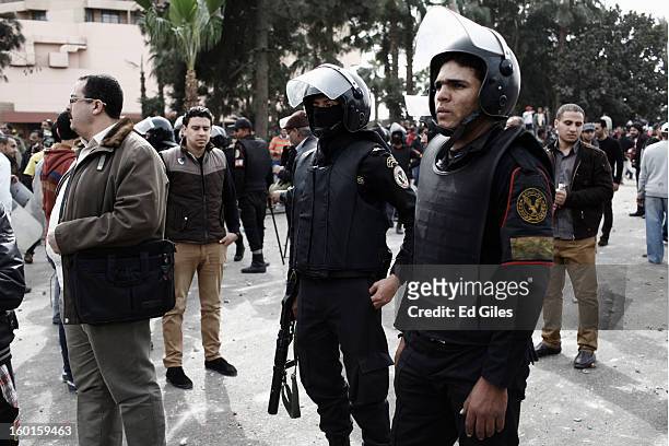 Egyptian riot policemen stand amonst Egyptian civilians during a demonstration in Tahrir Square on January 27, 2013 in Cairo, Egypt. Violent protests...