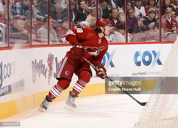 Alexandre Bolduc of the Phoenix Coyotes looks to pass the puck against the Columbus Blue Jackets at Jobing.com Arena on January 23, 2013 in Glendale,...