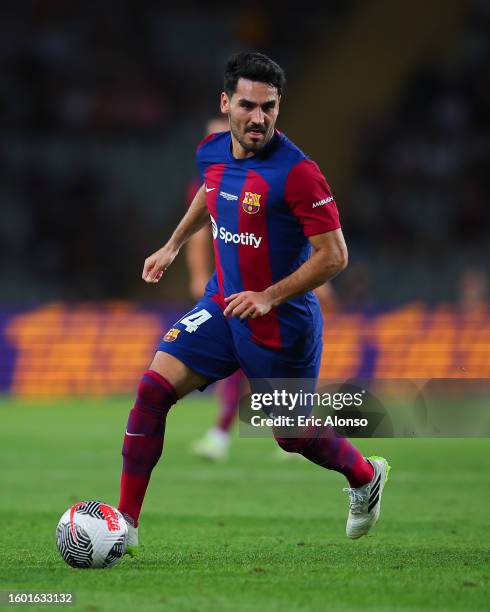 Ilkay Gundogan of FC Barcelona run with the ball during the Joan Gamper Trophy match between FC Barcelona and Tottenham Hotspur at Estadi Olimpic...