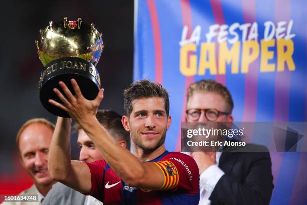 Sergi Roberto of FC Barcelona lift the Joan Gamper trophy the Joan Gamper Trophy match between FC Barcelona and Tottenham Hotspur at Estadi Olimpic...