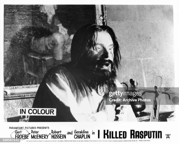 Gert Fröbe putting his hand to his chest in a scene from the film 'Rasputin', 1968.