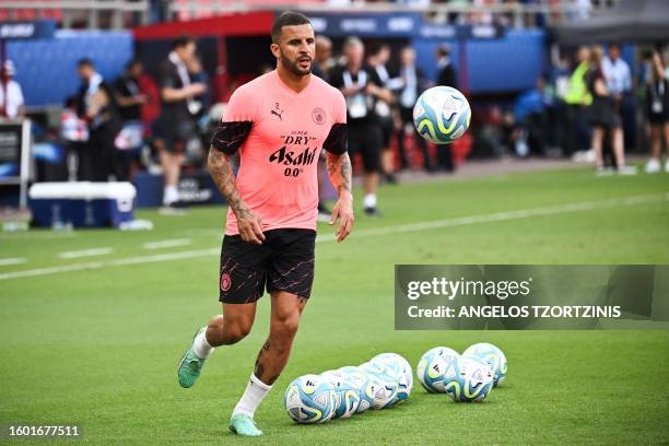 Manchester City's English midfielder Kyle Walker takes part in a training a session on the eve of the UEFA Super Cup football match between...
